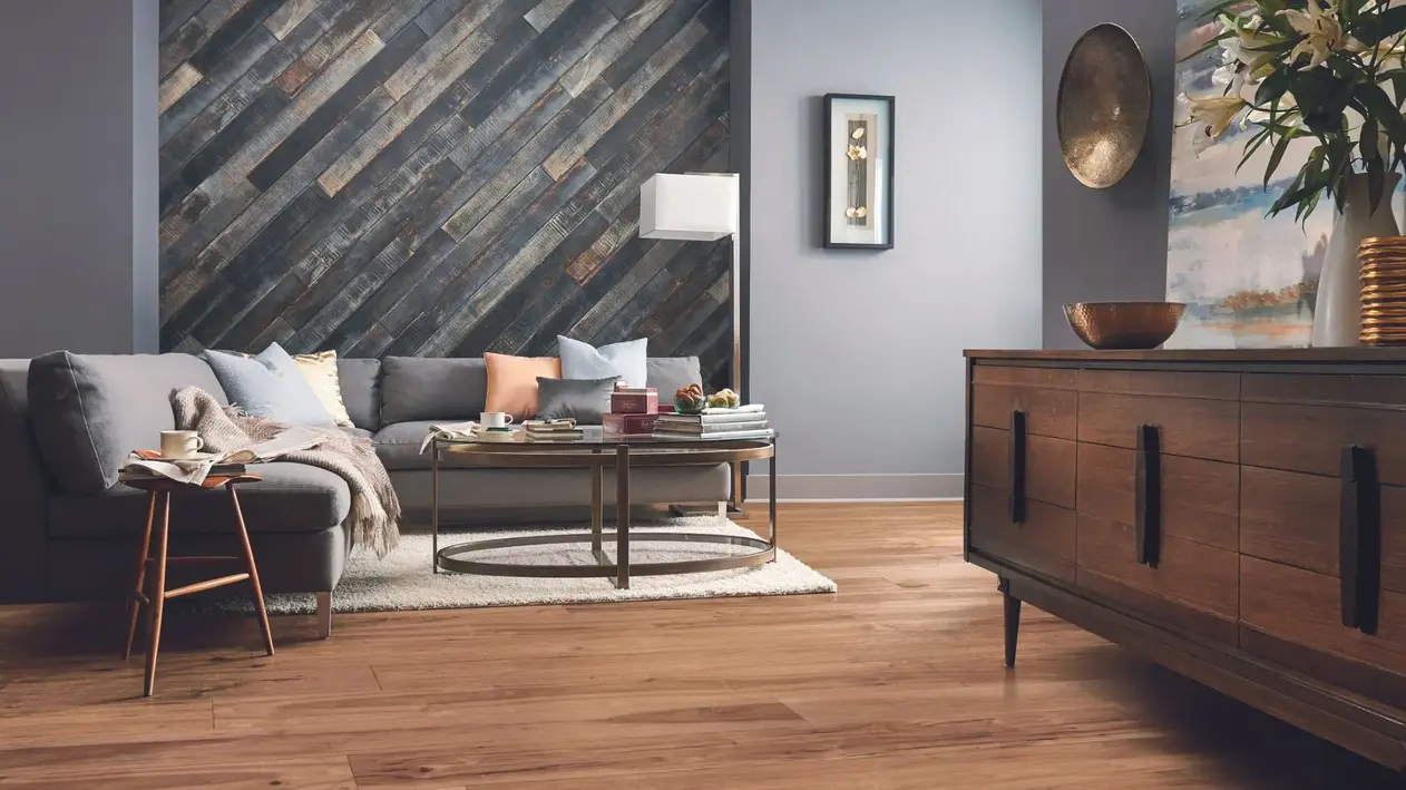 medium toned hardwood flooring in living room